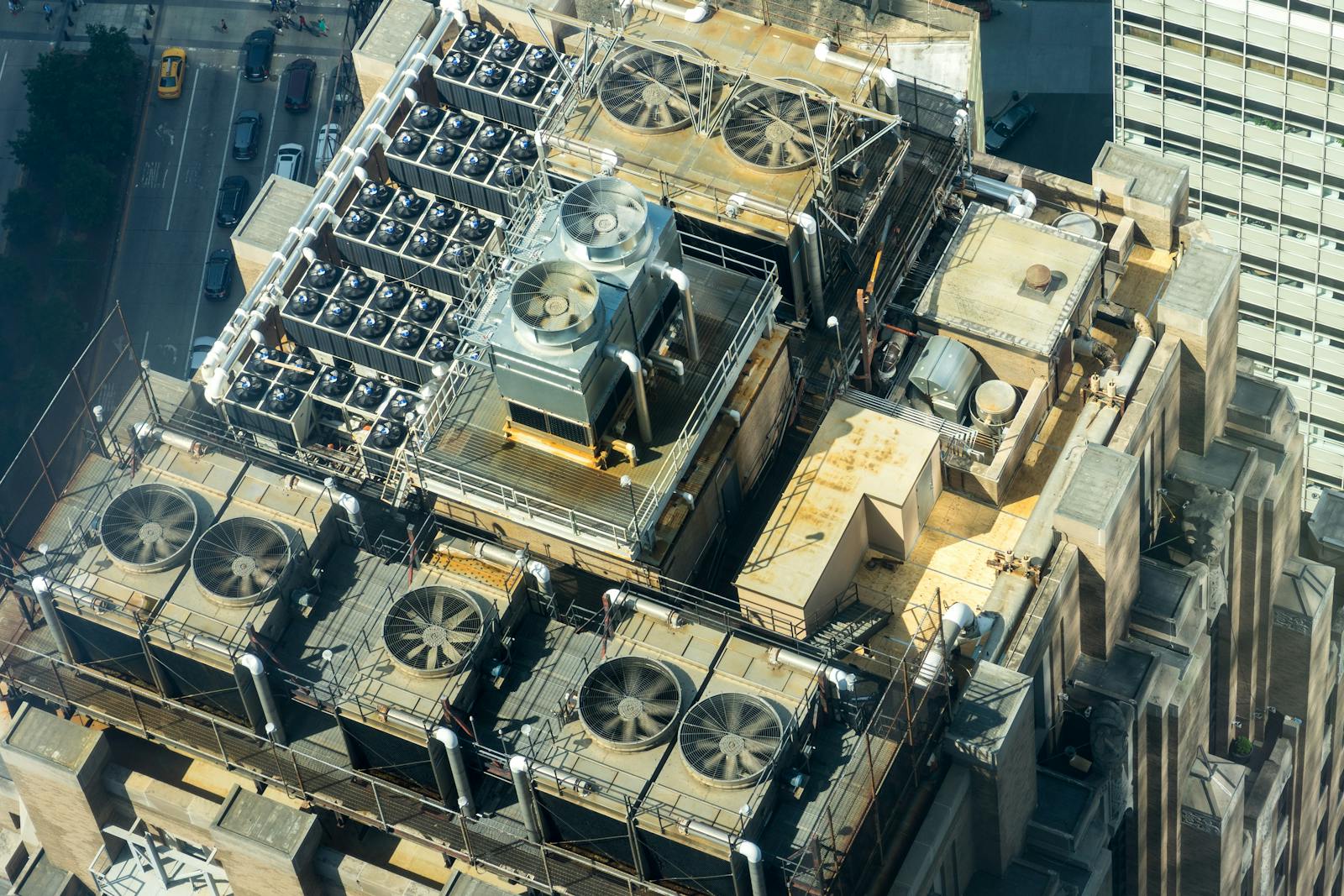HVAC commissioning — high-rise rooftop with cooling towers, the kind of equipment we verify on new construction Cx